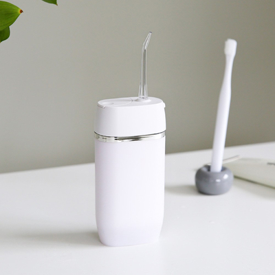 Mini Ipx7 165ml Water Tank Water Flosser Oral Irrigator With 2 Tips